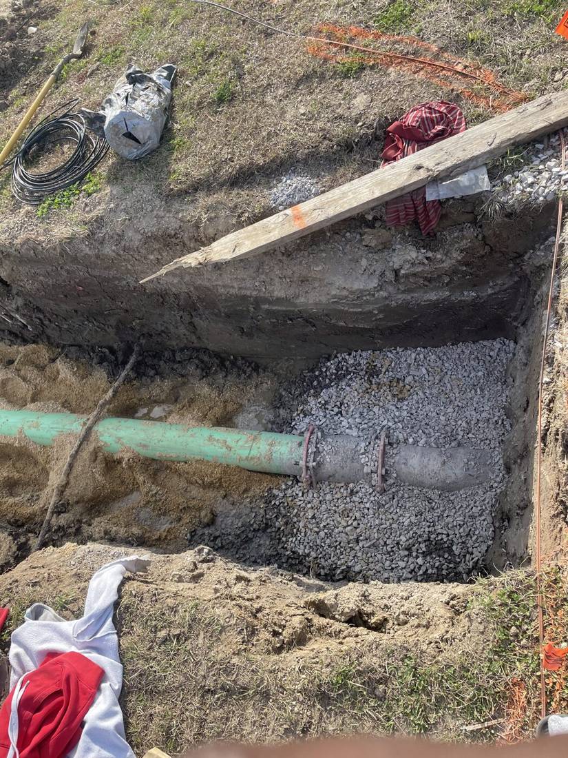 Sewer main in trench